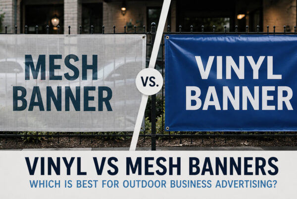 Here are alt text options incorporating the exact-match keyword "Vinyl vs Mesh Banners", structured for accessibility and SEO optimization: Option 1: Standard & Accessible (Recommended) alt="A side-by-side comparison of a mesh banner and a solid blue vinyl banner mounted on a black metal fence, highlighting vinyl vs mesh banners for outdoor business advertising." Option 2: Short & Direct (SEO Focused) alt="Side-by-side comparison illustrating vinyl vs mesh banners mounted outdoors on a fence.